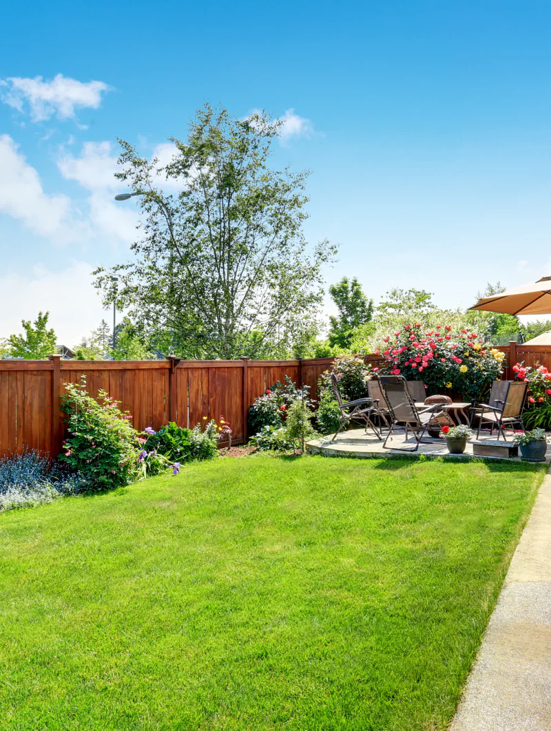 house with wooden privacy fence